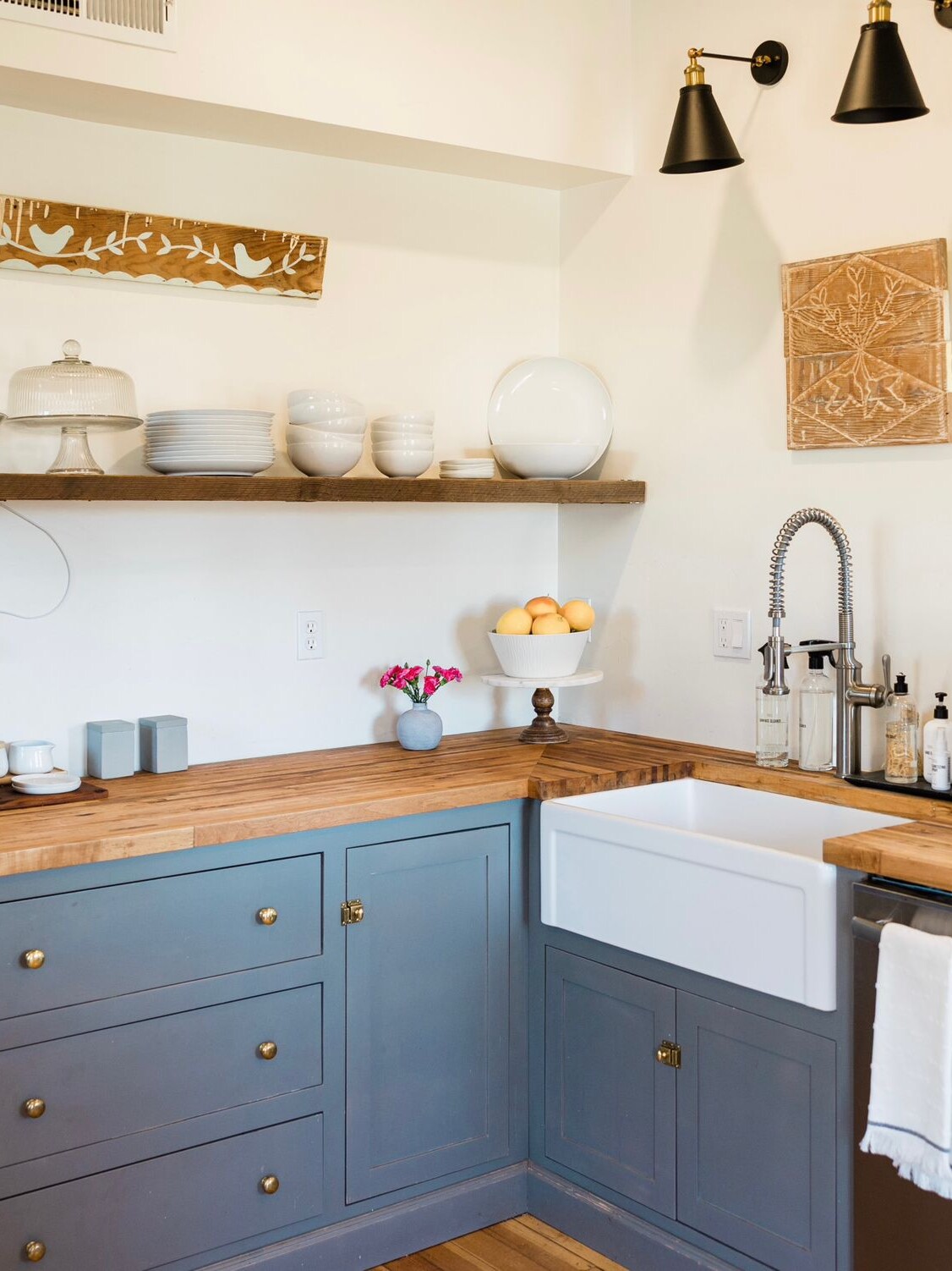 A kitchen with a bespoke wooden counter top.